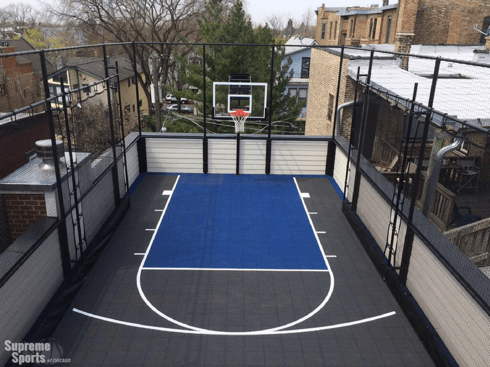 Gray and blue rooftop basketball court in Chicago